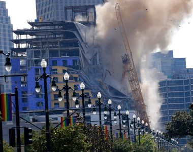 New Orleans implodes damaged cranes on partially collapsed Hard Rock hotel