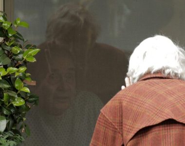 Coronavirus: Woman, 88, pictured chatting with quarantined husband of 60 years through window