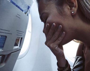There's a sick person on my flight: What do I do?