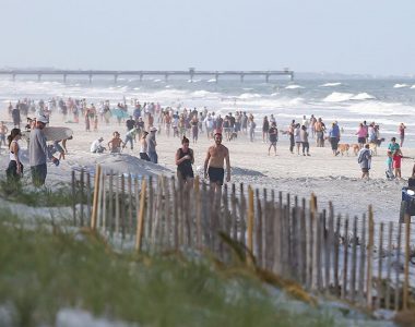 Crowds flock to Jacksonville beaches; model significantly lowers Florida's expected coronavirus death toll