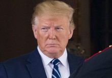 Trump signs executive order temporarily suspending immigration into US amid coronavirus