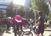 Seattle police release bodycam footage of protesters throwing projectiles at them